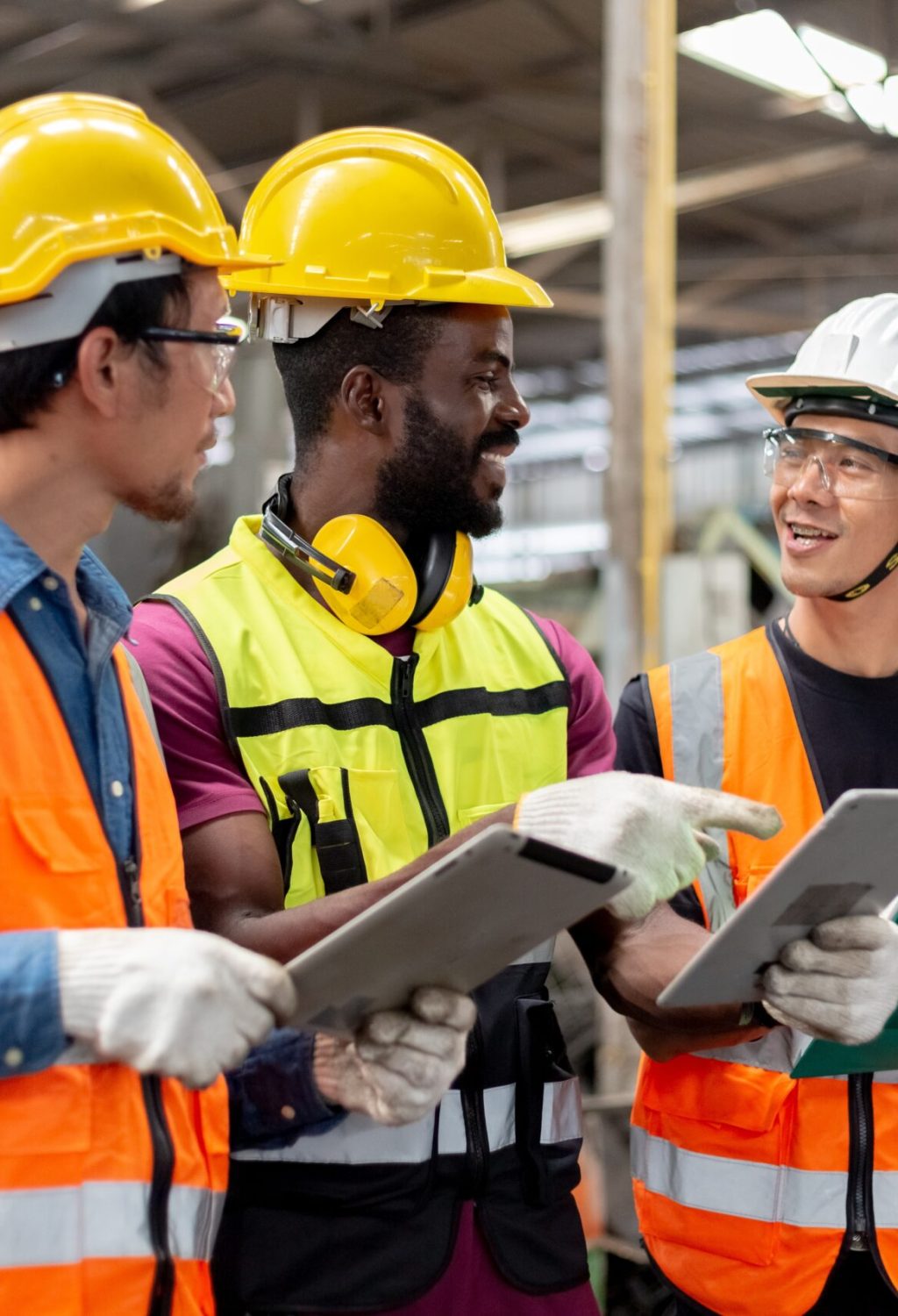 Three,Man,Industrial,Engineers,Wear,Hard,Hats,And,Uniform,Using